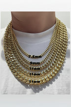 Gold chain necklace with size measurements on a white shirt