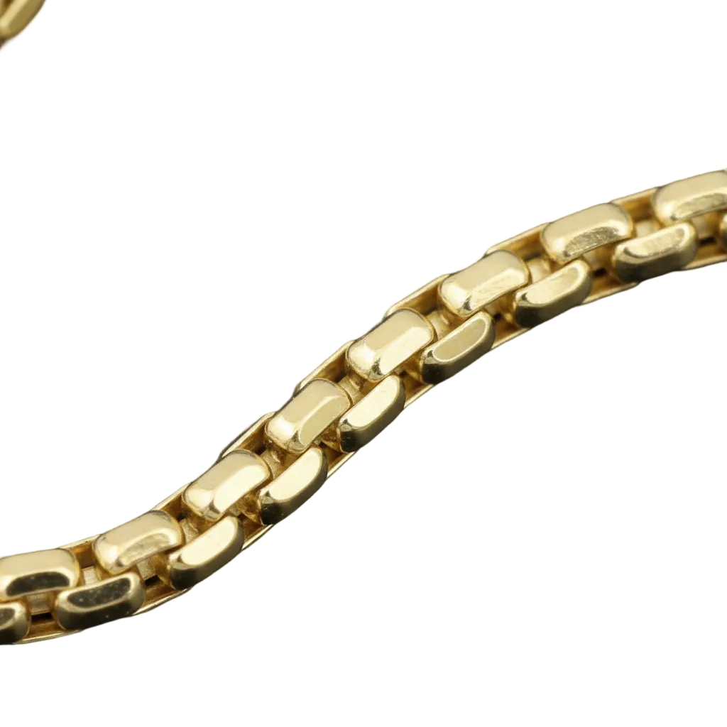 A close-up of a polished yellow gold chain with a textured, elongated link design, set against a dark, solid background.