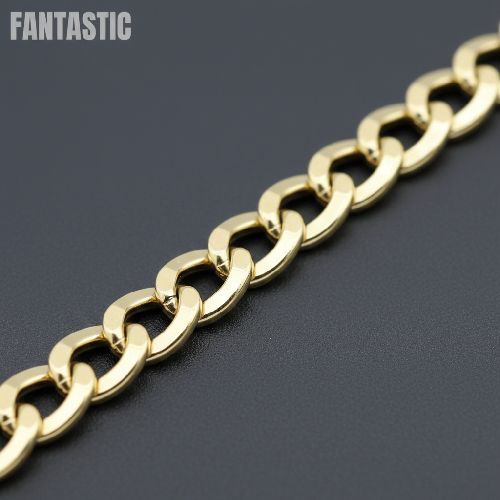 A close-up of a shiny gold Cuban link chain running diagonally across a dark gray textured background, with the word 'FANTASTIC' in the top-left corner.