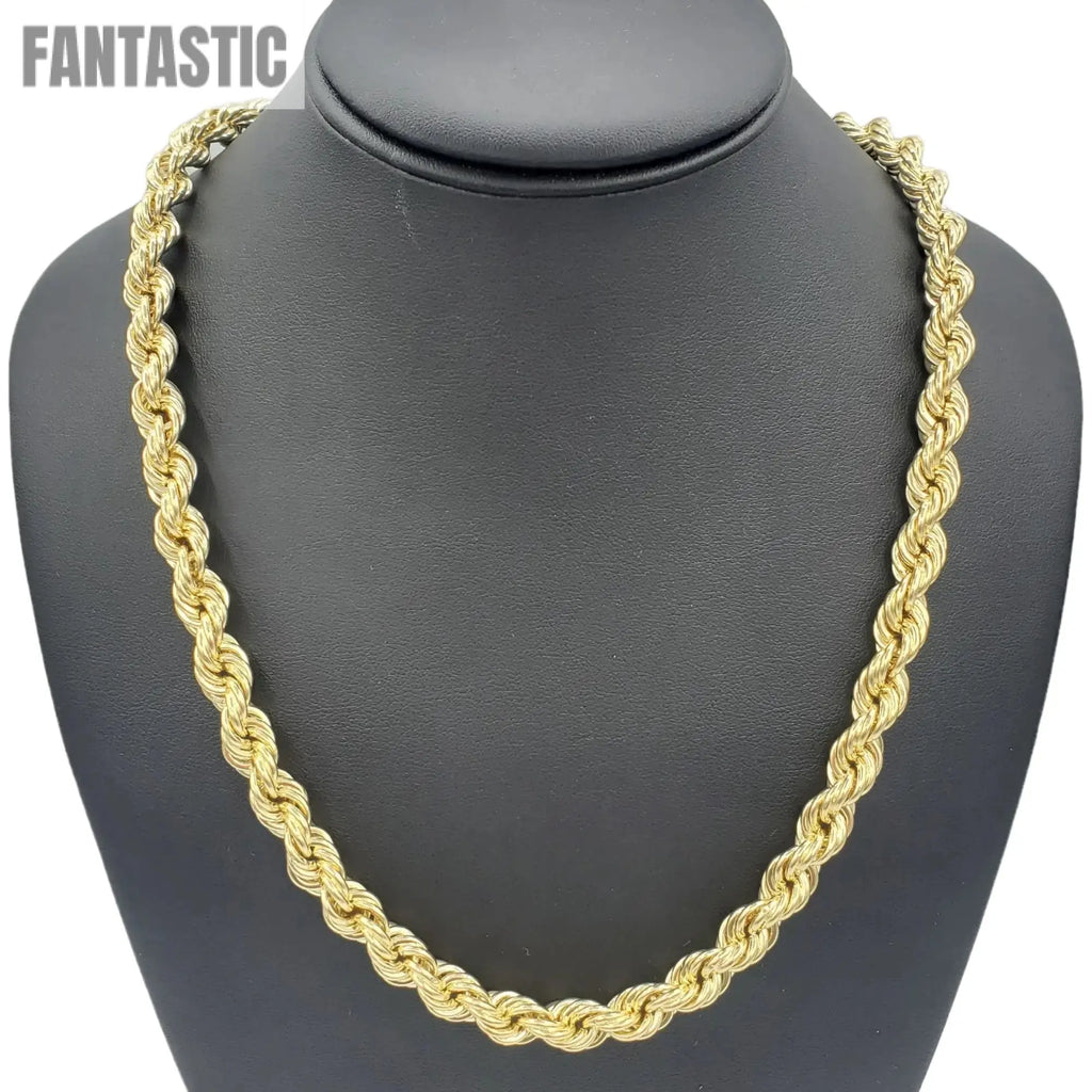 Gold rope chain necklace on a black mannequin bust