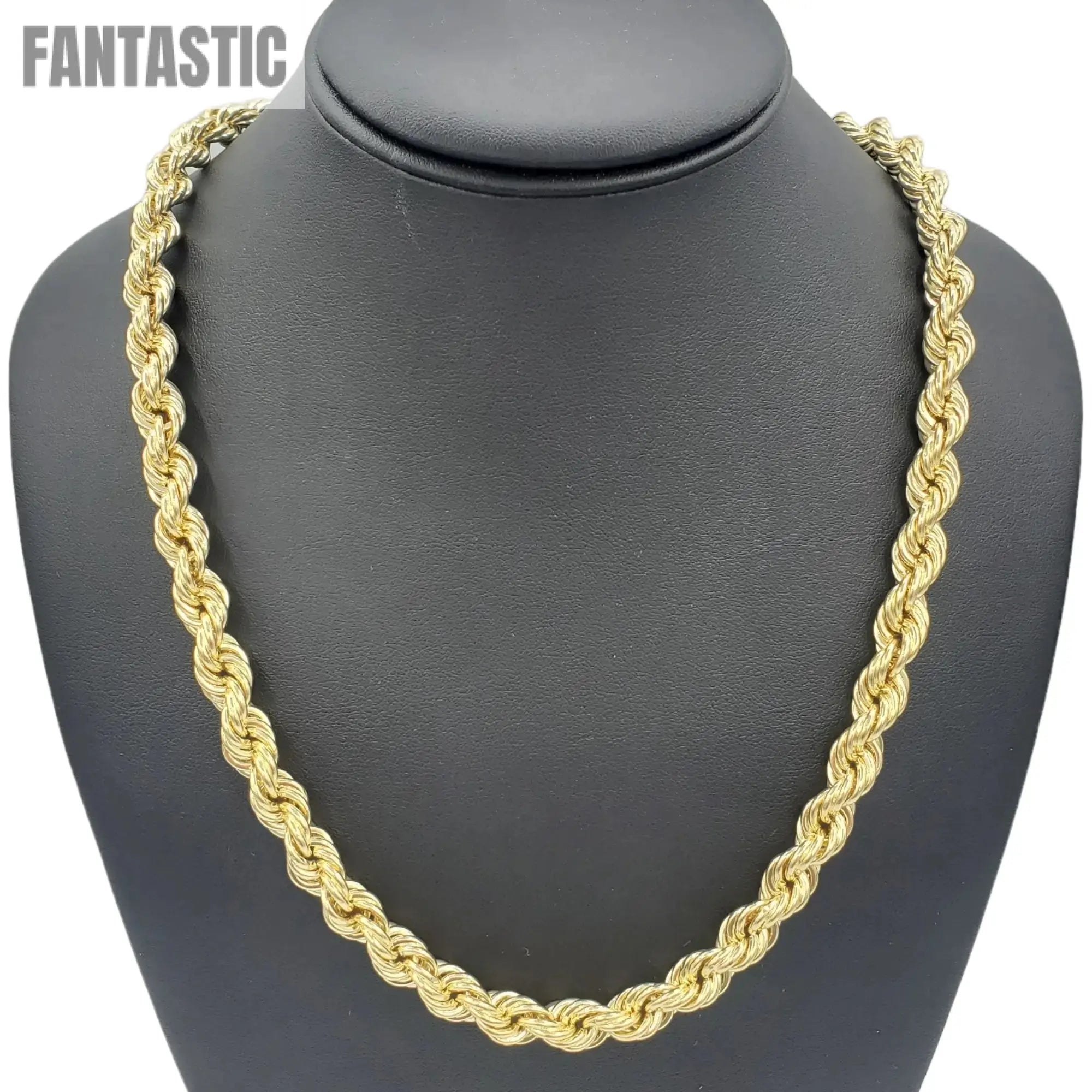 Gold rope chain necklace on a black mannequin bust
