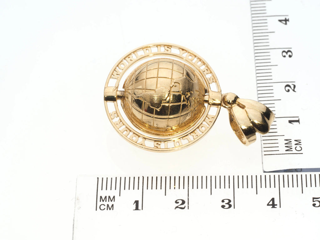 14K gold World Is Yours pendant close-up