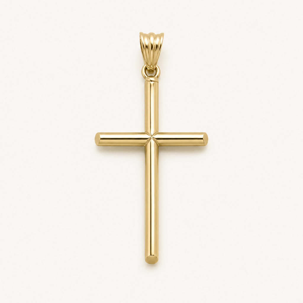 A polished yellow gold cross pendant with a smooth, rounded design and a decorative bail, shown against a clean off-white background.