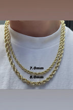 Two gold rope chain necklaces worn on a person's neck over a white t-shirt, with text overlays indicating 7.0mm and 8.