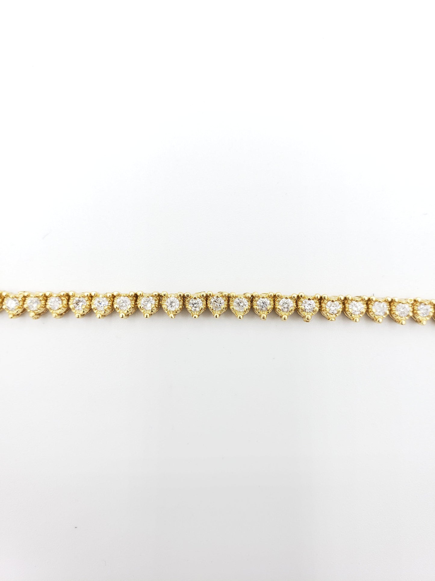 14K Gold- Diamond Pointer Tennis Chain 40.3 Grams