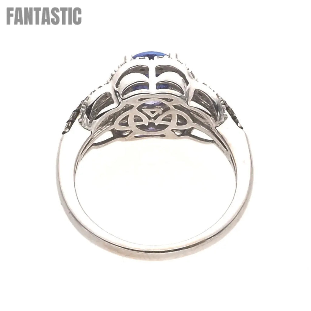 14K white gold blue topaz engagement ring detail