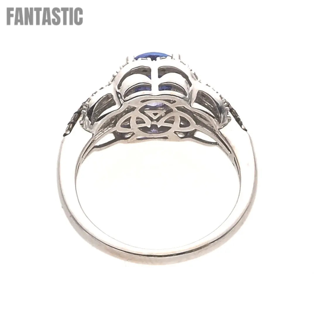 14K white gold blue topaz engagement ring detail
